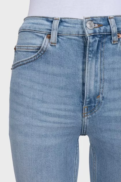 Light blue straight-leg jeans with tag