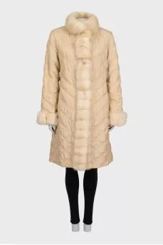 Reversible buttoned fur coat