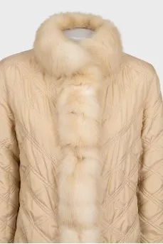 Reversible buttoned fur coat
