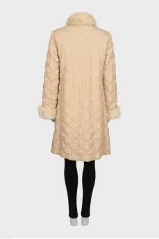 Reversible buttoned fur coat