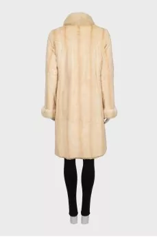 Reversible buttoned fur coat