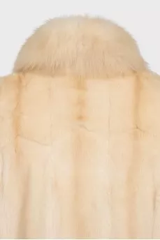 Reversible buttoned fur coat