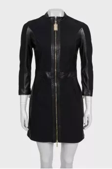 Black dress with a zipper and leather inserts