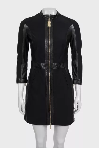 Black dress with a zipper and leather inserts