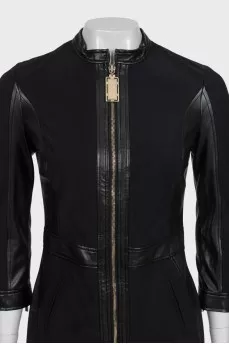 Black dress with a zipper and leather inserts