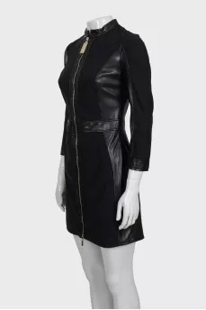 Black dress with a zipper and leather inserts