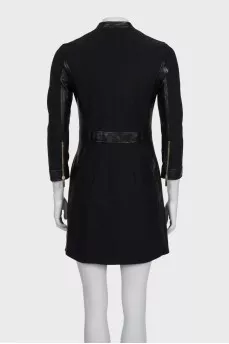 Black dress with a zipper and leather inserts