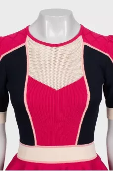 Fitted dress with a peplum
