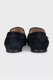 Black suede loafers with embellished strap