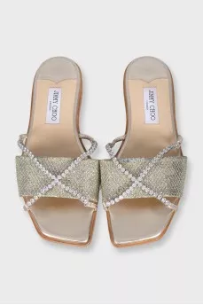 Gold leather flip-flops decorated with crystals
