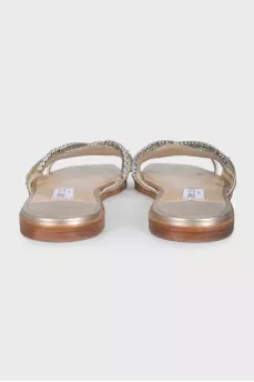 Gold leather flip-flops decorated with crystals