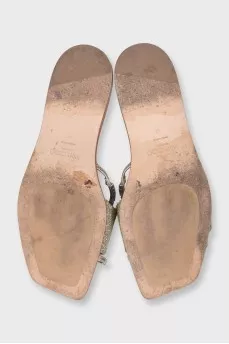 Gold leather flip-flops decorated with crystals