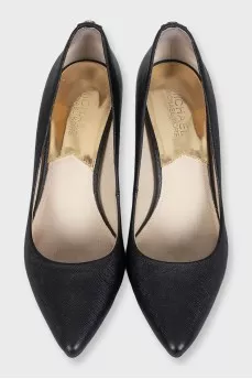 Black leather shoes with stacked heels
