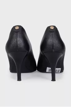 Black leather shoes with stacked heels
