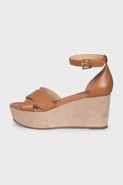Brown leather sandals with suede wedge heels