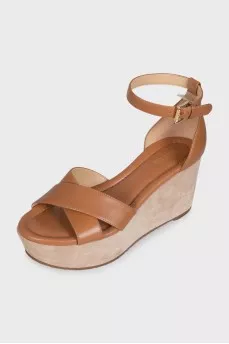 Brown leather sandals with suede wedge heels