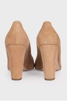 Beige suede high heel shoes