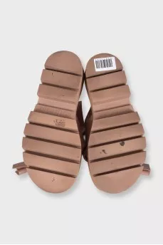 Beige rubber flip-flops