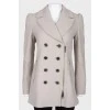 Double-breasted coat with buttons and zipper