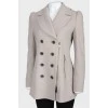 Double-breasted coat with buttons and zipper