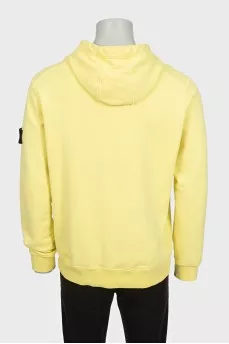 Men's yellow hoodie with branded patch