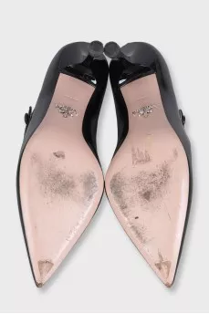 Black leather shoes with a bridge