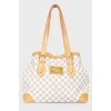 Leather brown bag with brand's branded print