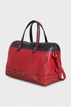 Red leather tote bag decorated with perforations