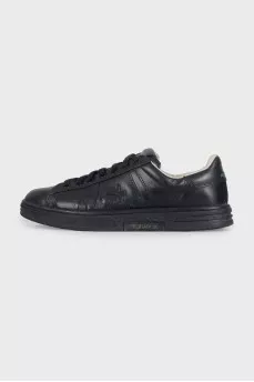 Men's black sneakers decorated with stripes