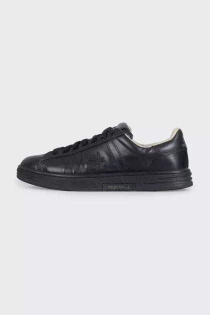 Men's black sneakers decorated with stripes