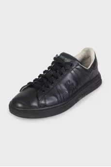 Men's black sneakers decorated with stripes