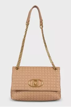 Brown quilted leather bag with tag