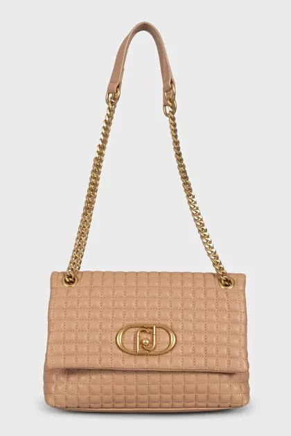 Brown quilted leather bag with tag