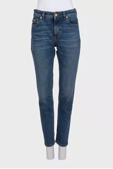 Straight-leg blue jeans with a distressed effect
