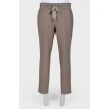 Wool trousers with arrows