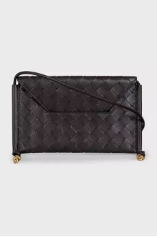 Woven leather bag with a thin strap