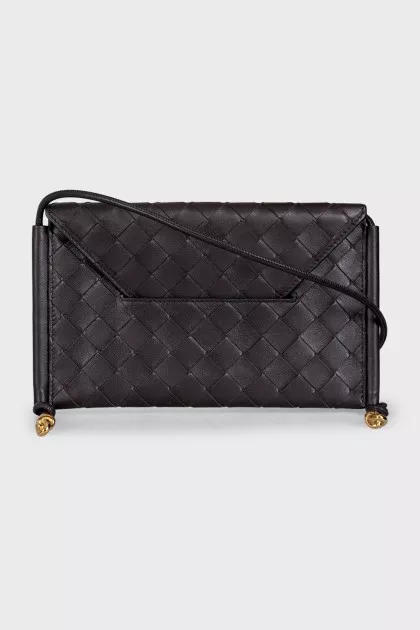 Woven leather bag with a thin strap