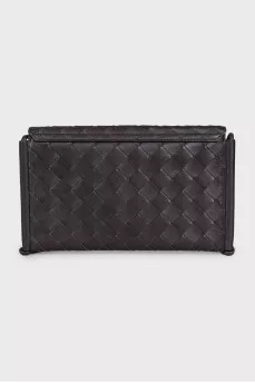 Woven leather bag with a thin strap