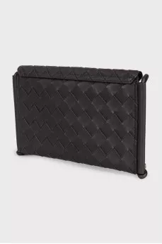 Woven leather bag with a thin strap