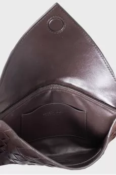 Woven leather bag with a thin strap