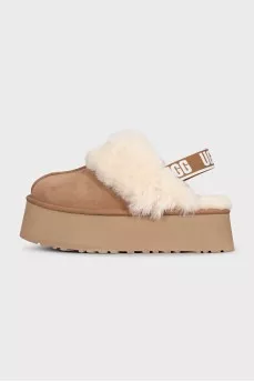 Brown insulated UGG boots with elastic