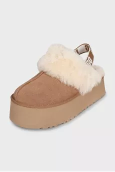 Brown insulated UGG boots with elastic