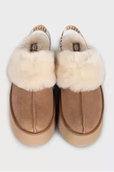 Brown insulated UGG boots with elastic