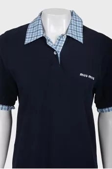 Blue polo shirt with a checkered print collar