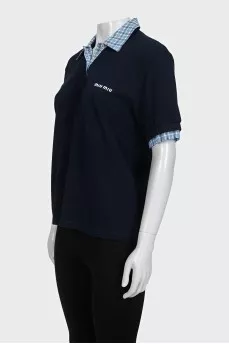 Blue polo shirt with a checkered print collar