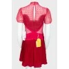 Crimson lace dress with a tag