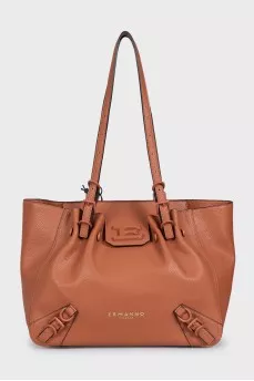 Brown leather tote bag with tag