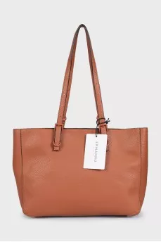 Brown leather tote bag with tag