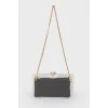 Transparent bag with suede black clutch inside