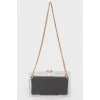 Transparent bag with suede black clutch inside